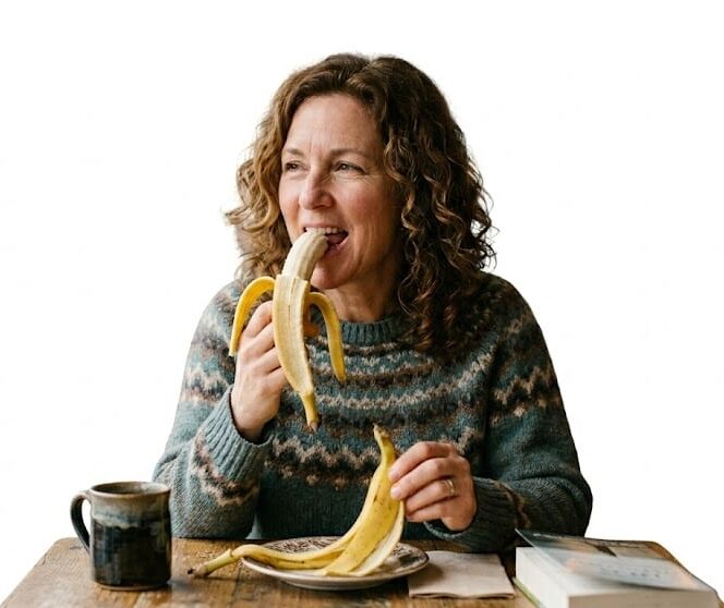 woman eating a banana